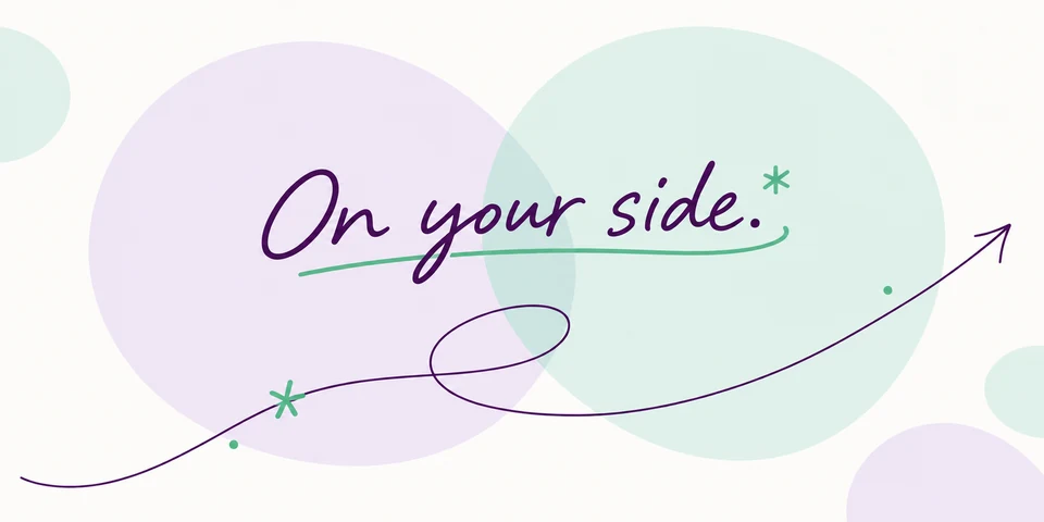 On your side. Our handwritten plum lettering, mint underline and looping arrow over soft lavender and mint circles.